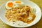 Rice noodles with fish curry topping boiled creamy egg yolk