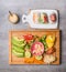 Rice paper rolls with vegetables ingredients and peanut dip