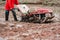 Rice planting tractor and farmer working in rice field for prepare organic farmland of agriculture in rural