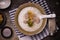 Rice porridge pork porridge in brown cup on gray background