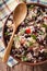 Rice with red beans in a bowl close-up on the table. vertical to