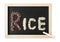 Rice seed on a blackboard white background