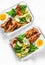 Rice, stewed vegetables, egg, teriyaki chicken - healthy balanced lunch box on a light background