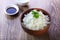 Rice on wooden background