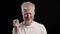 Rich Albino Guy Showing Money Cash Posing Over Black Background