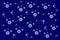 Rich blue background with small openwork snowflakes