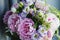 Rich bunch of pink peonies peony and lilac eustoma roses flowers. Rustic style, still life. Fresh spring bouquet, pastel