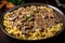 Rich and creamy beef stroganoff with tender strips of meat, mushrooms, and onions, served over a bed of egg noodles