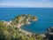 Rich exotic vegetation plants at Isola Bella, Taormina, Italy