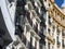 Rich facades in baroque architectural style with elegant windows and balconies in Chamberi central district of Madrid, Spain.