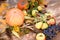 Rich harvest on rustic table, organic seasonal fruit and vegetable