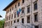 Rich ornate facade of the Palazzo della Carovana in the center of Pisa