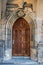 Richly carved oak door with portal at St. Vitus Cathedral Prague