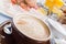 Richly covered european breakfast table with coffee, bread,eggs and orange juice