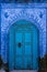 Richly decorated blue door