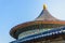 Richly decorated roofs of the Chinese gate, small colorful details with figurines