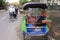 Rickshaw driver asleep in becak in Yogyakarta, Java, Indonesia