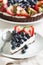Ricotta tart with strawberry and blueberry