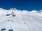 Ride in the chairlift over white slopes in the deserted ski area