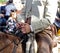 Rider on horseback dressed in traditional costume and holding glass of fino sherry manzanilla sherry at the April Fair