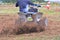 Rider on a quad motorbike.