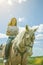 The rider on the white horse. Young horsewoman riding on white horse, outdoors view. girl on white horse runs free. toned