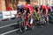 Riders for Etixx Quick Step and Katusha teams lead the way on Rue du Dr Alibert in Montauban, on