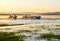 The riders and onrushing manada in the lake