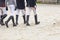 Riders walking a course at horse jumping competition