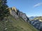 Ridge hike between Fronalpstock and Nuenchamm. Mountain experience in the Glarus Alps. View of the Murtschenstock.