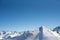 Ridgeline in winter sunny day. Elbrus West Peak view. Dombay ski resort, Western Caucasus, Russia. Wallpaper background