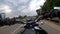 Riding a black motorcycle on a tarmac road driver point of view timelapse