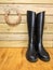 Riding boots in a stable