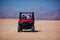 Riding a buggy car through the desert. thrill tourism adventures