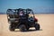 Riding a buggy car through the desert. thrill tourism adventures