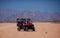 Riding a buggy car through the desert. thrill tourism adventures