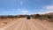 Riding dirt road desert landscape recreation vehicle POV 4K