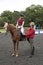 Riding lesson with the rider and instructor