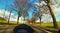 Riding a Motorbike on a road between the Fields