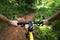 Riding mountain bike fast on a trail