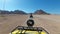 Riding a quad in the desert of Egypt. First-person view. Rides ATV bike.