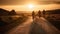 Riding into the Sunset, Back View of Cyclists on a Scenic Road