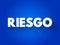 Riesgo spanish words for Risk text quote, concept background