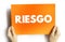 Riesgo spanish words for Risk text quote, concept background