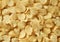 Riffle golden chips with texture potato background