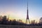 Riga. Famous Landmark Television Tower Natural Sunset Or Sunrise Colors Sky.