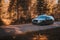 Riga, Latvia 21 October 2021: Front view of Audi A6 3.0 TDI Quattro in the sunny autumn forest, auto in fast motion with a blurred