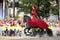 RIGA, LATVIA - AUGUST 21: Camilla Naprous from The Devils Horsemen stunt team riding beautiful black horse during Riga Festival o