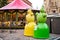 Riga, Latvia - December 09 2019. recycling. Colorful snowmen, green and yellow. Bins for separate collection of garbage