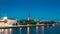 Riga, Latvia, Europe. Cityscape Skyline In Evening Time. Night View Of Castle, Dome Cathedral And St. Peter's Church